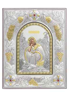 Icoană argintată Sf. M. Mc. Dimitrie, Izvorâtorul De Mir. Dimensiune 25 x 20 x 2 cm. Icoană cu ramă argintată și pietre roșii, pe suport de lemn, cu picior de sprijin.